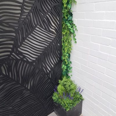 Planter box with trailing artificial plants