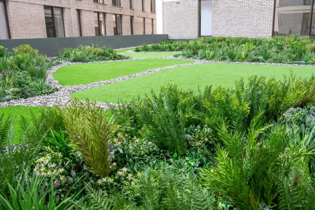 an artificial green roof installation by Vistafolia