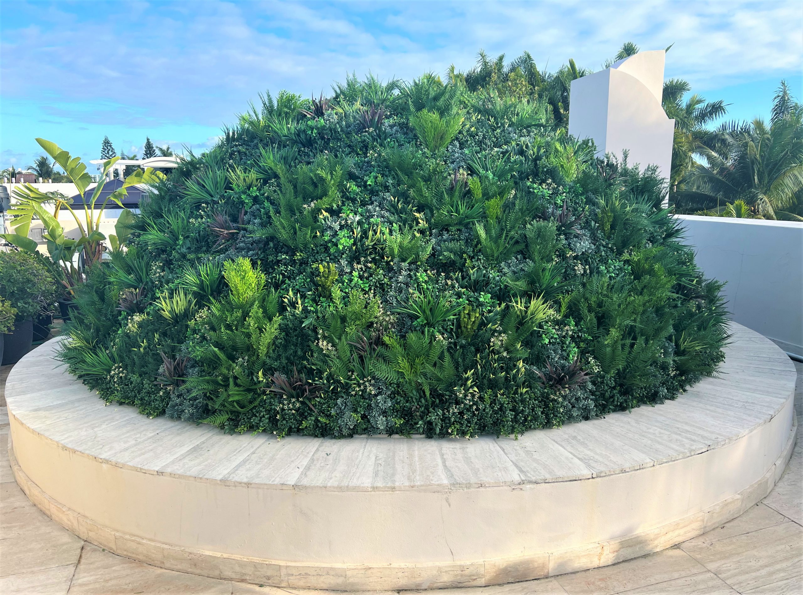 an artificial green wall installation by Vistafolia in Miami Florida